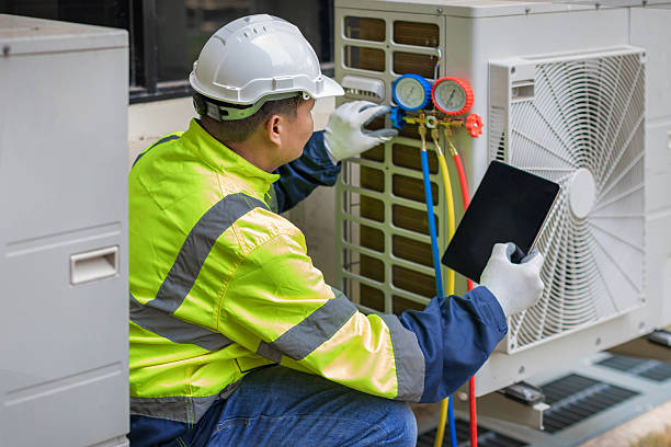 Professional Air Conditioning Repair technician working in Newark, IL